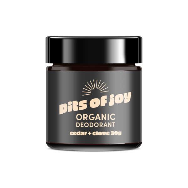 A 30g jar of Pits of Joy organic deodorant paste, in Cedar and Clove